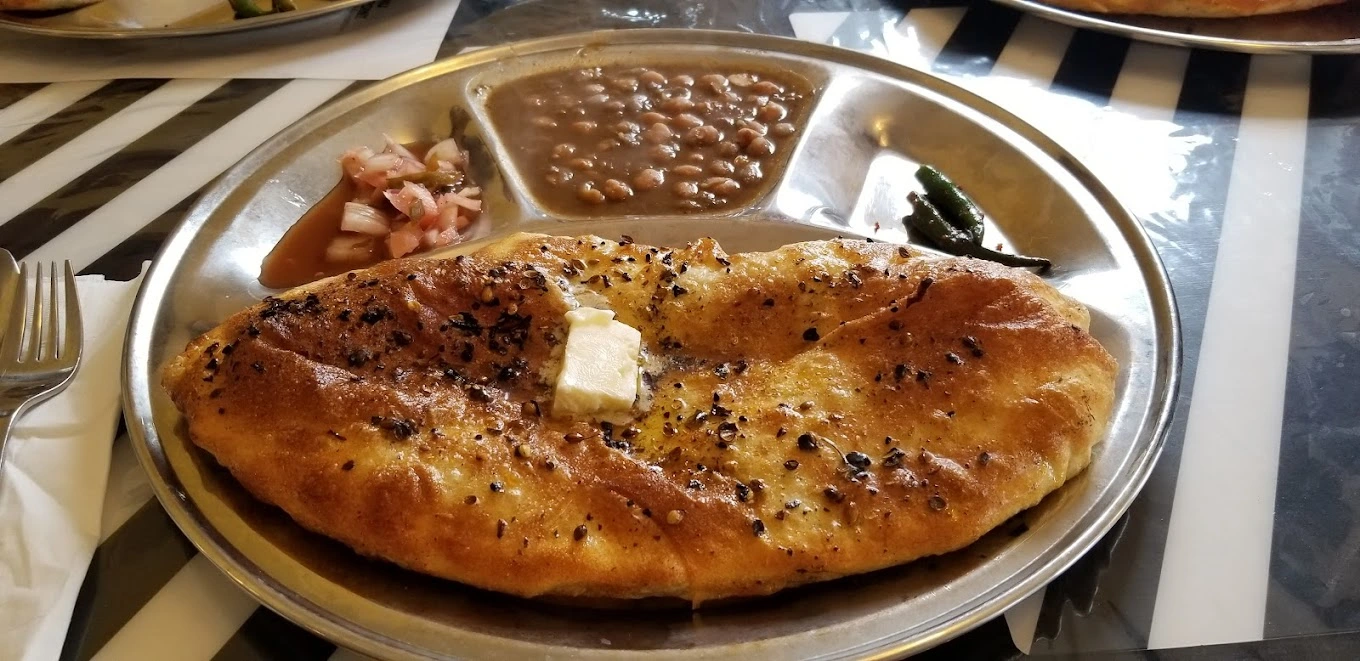 Signature Amritsari Kulchas - Traditional Punjabi Stuffed Bread at Amritsari Kulcha Point Winnipeg